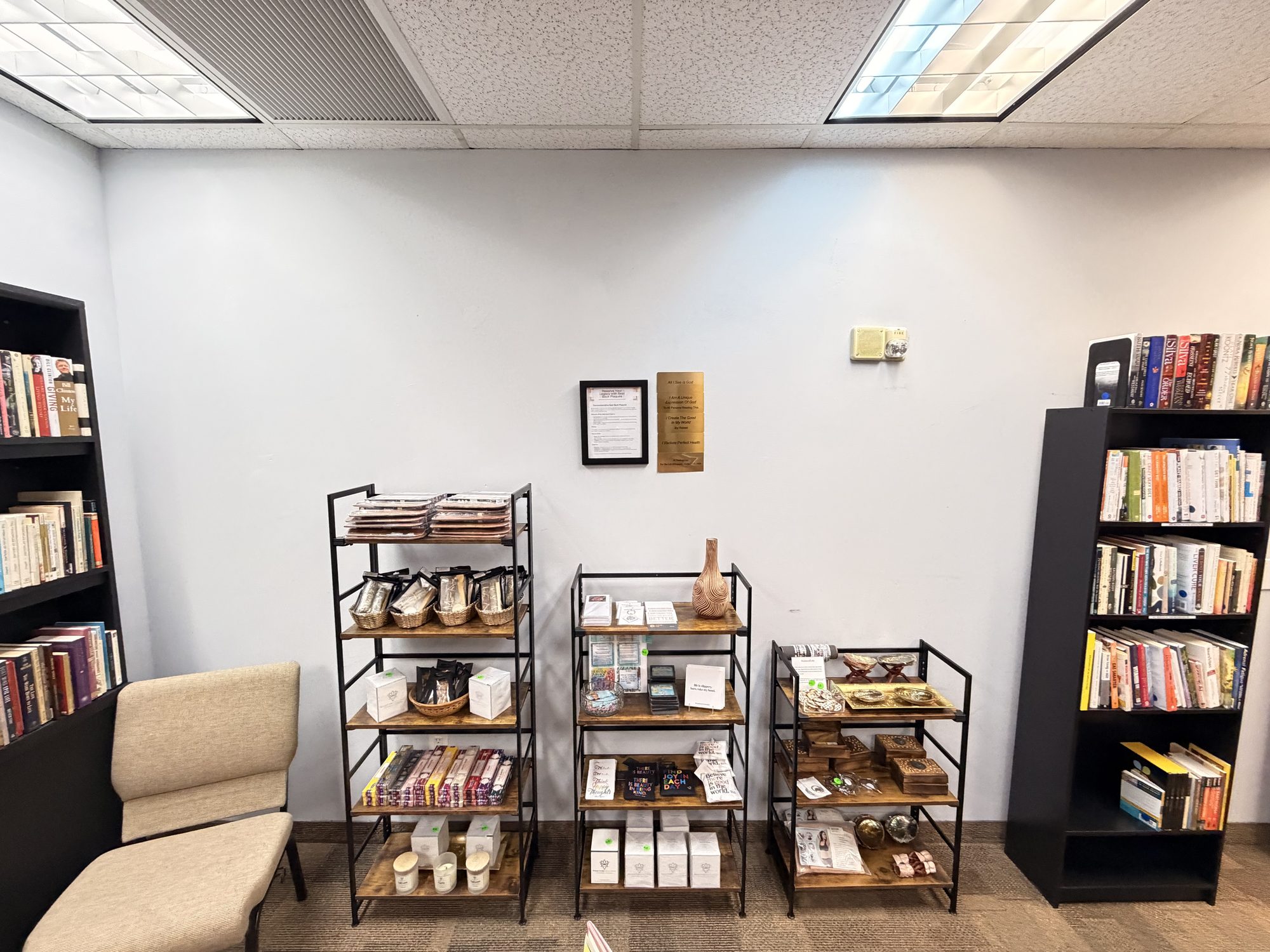 Gift and card racks beside a reading chair