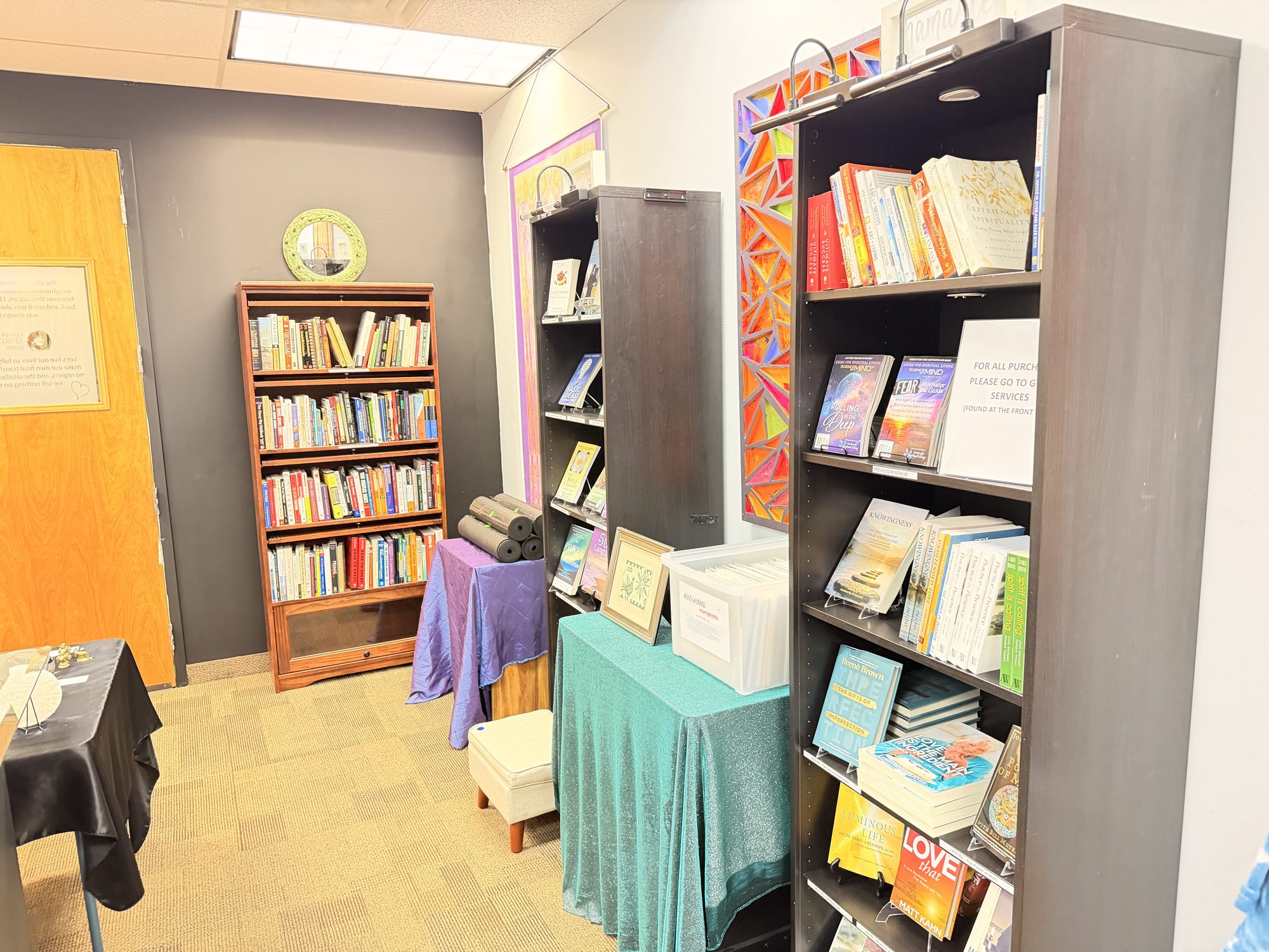 Bookcases filled with spiritual titles